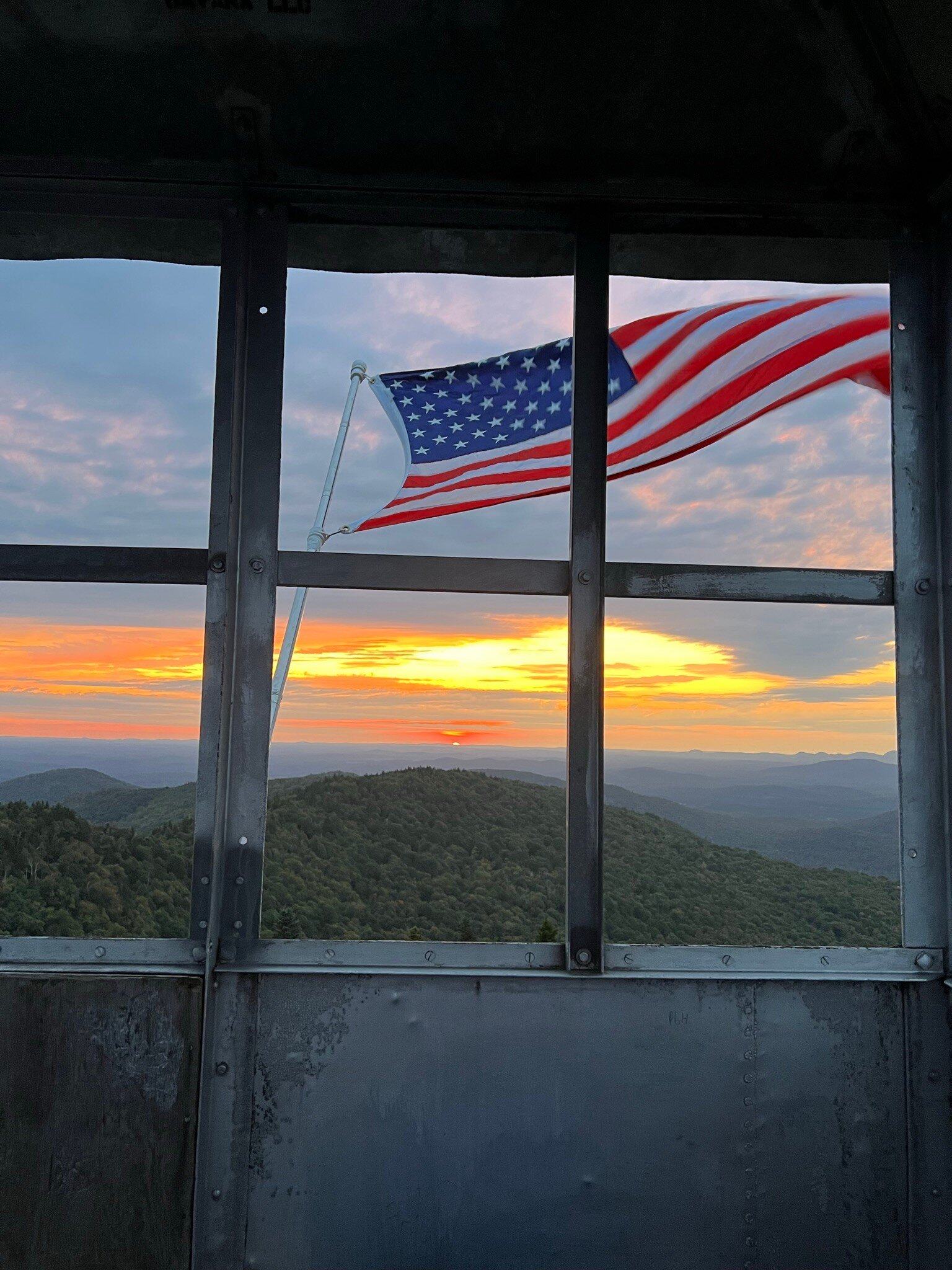 Flag and sunset
