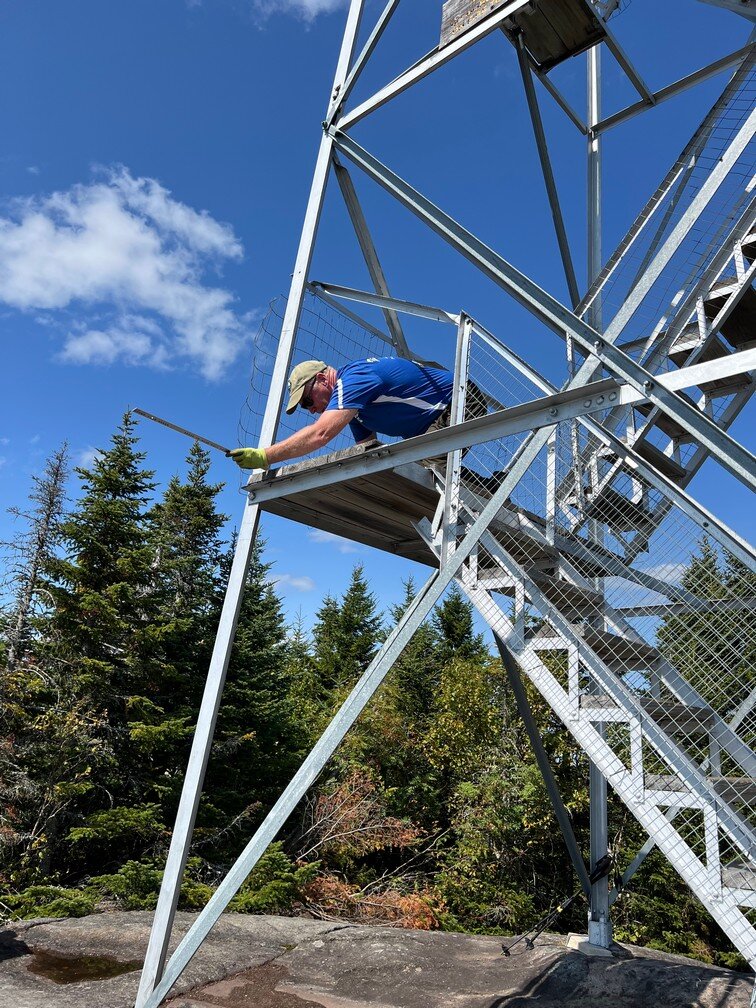 Jay working on railing side of first landing