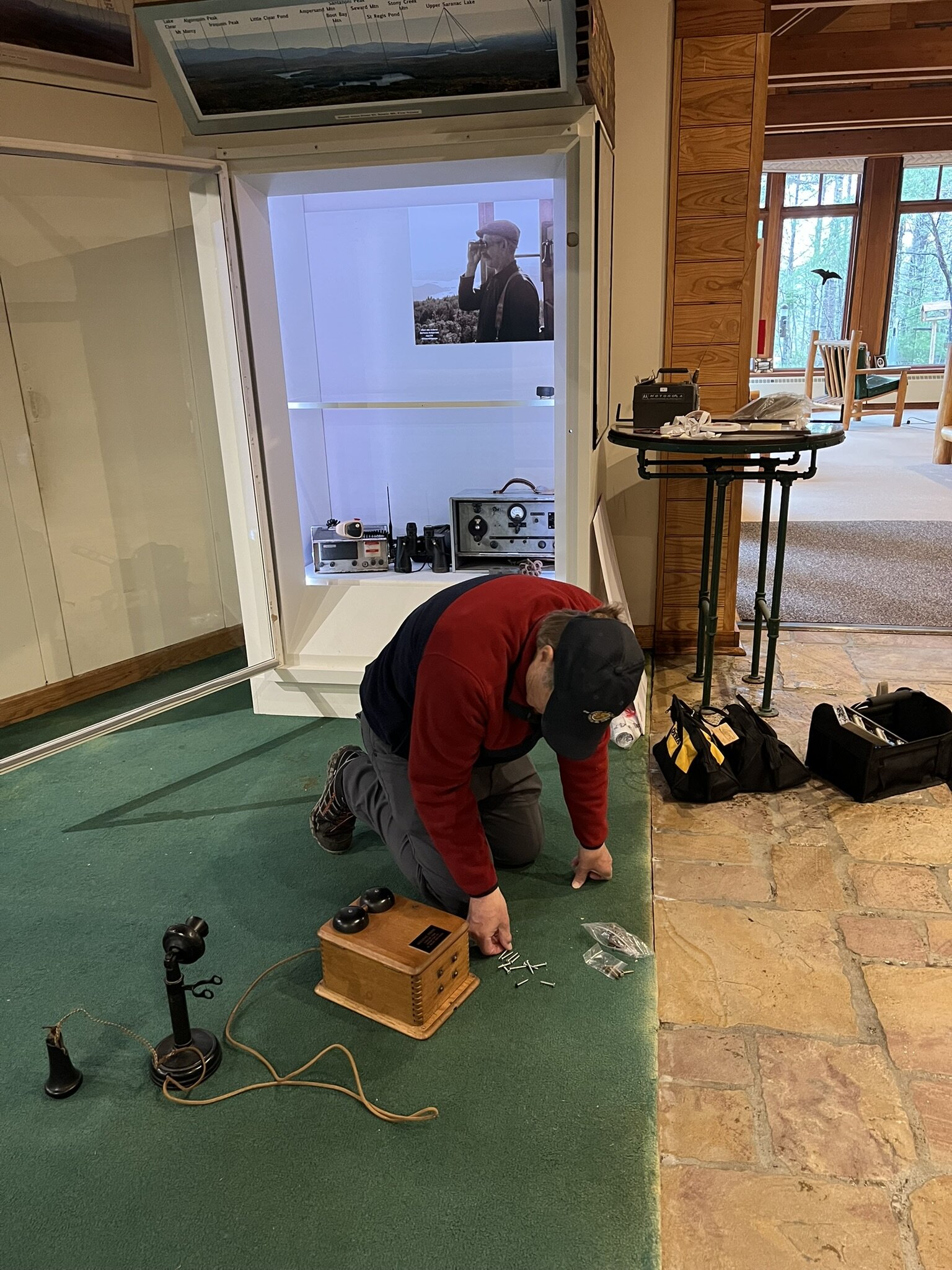 Doug preparing to hang original St Regis telephone