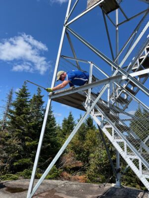 Jay working on railing side of first landing
