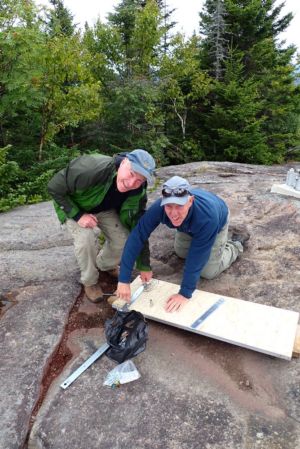 Jay and Jack installing the brackets