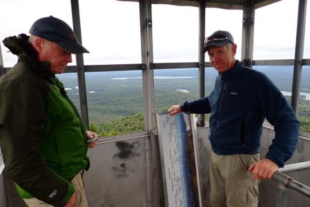 Jay and jack preparing to install the panels onto the ceiling